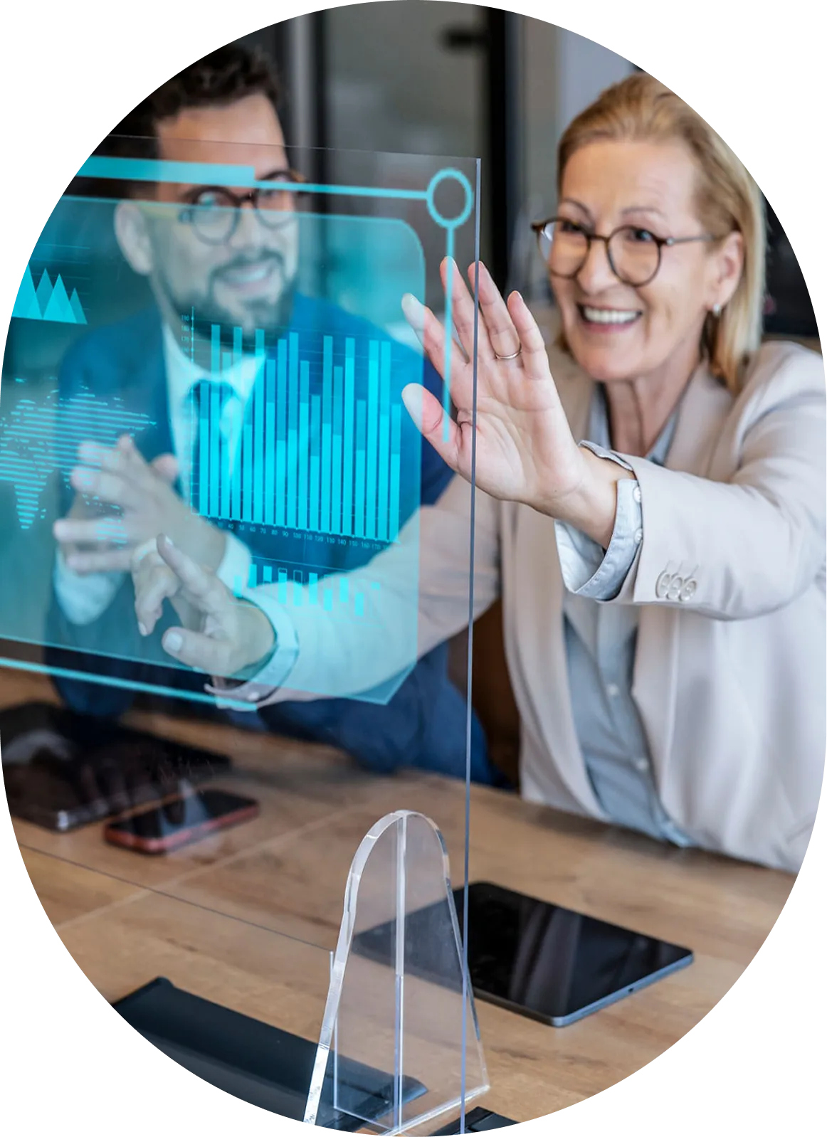 Two people interacting with futuristic digital screen.